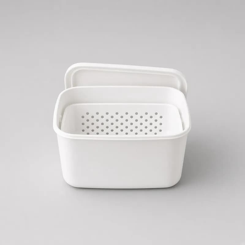 Reference photo of a denture bath box with an inner basket