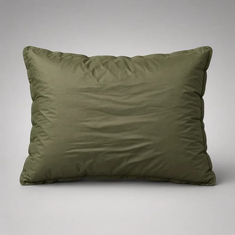 Reference photo of an inflatable camping pillow in olive fabric