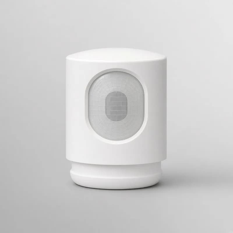 Reference photo of a small white PIR motion sensor