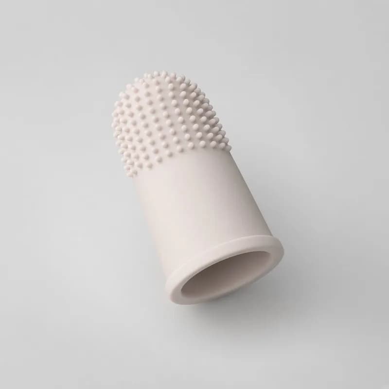 Reference photo of a soft silicone finger toothbrush
